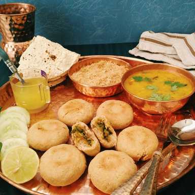 Baati cuit au four avec churme et recette DAL Panchratna Recette Indienne Traditionnelle