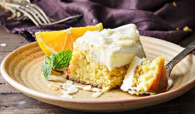 Gâteau orange sans flouille avec recette de glaçage au fromage à la crème Recette Indienne Traditionnelle