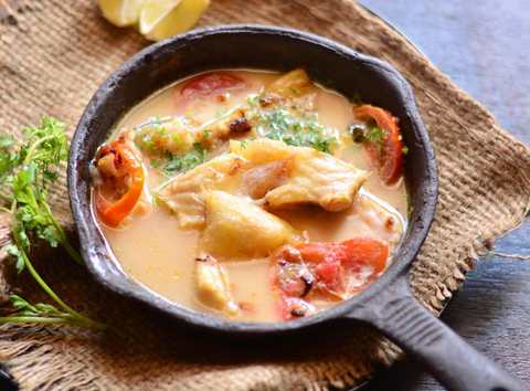 Poisson cuit au four dans la recette de lait de coco Recette Indienne Traditionnelle