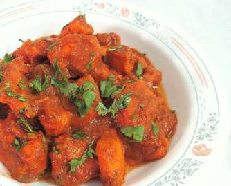 Poulet dans la recette de sauce d'oignon tomate Recette Indienne Traditionnelle