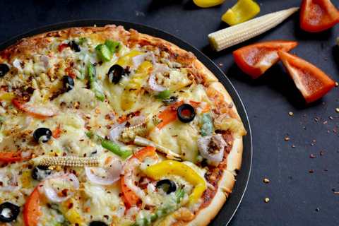 Recette de pizza à légumes de croûte à l'ail Recette Indienne Traditionnelle