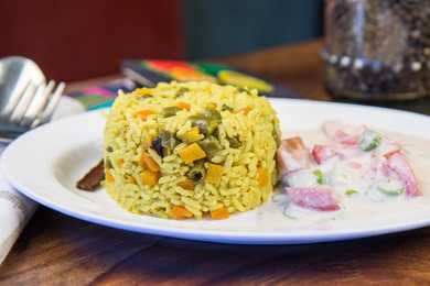 Recette de Pulao de potagne épicée d’une casserole avec lait de noix de coco Recette Indienne Traditionnelle