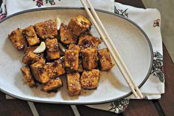 Tofu de style asiatique dans la recette de sauce orange épicée Recette Indienne Traditionnelle